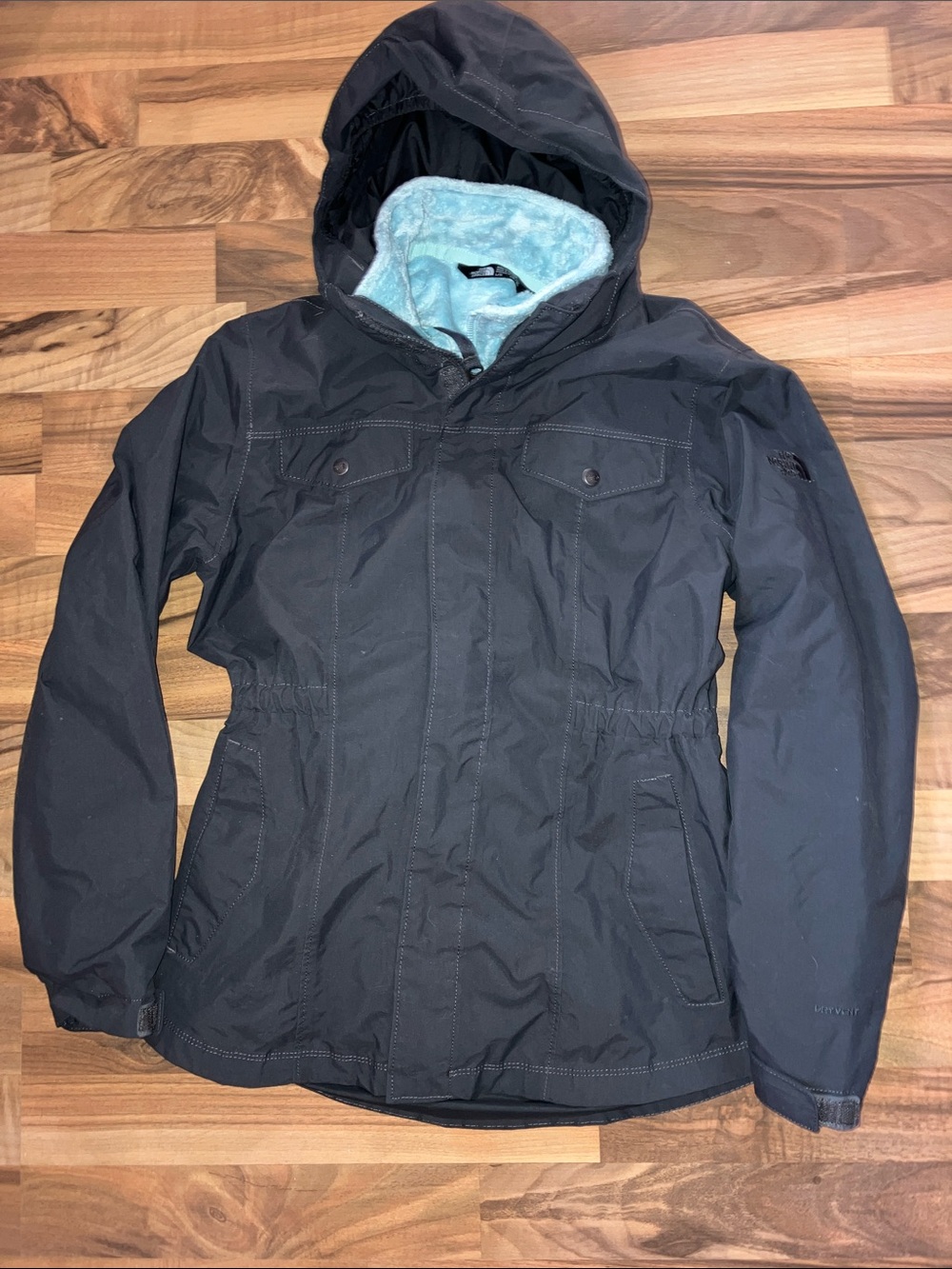 The North face girls Sz L 14/16 dark gray aqua blue fleece lined coat